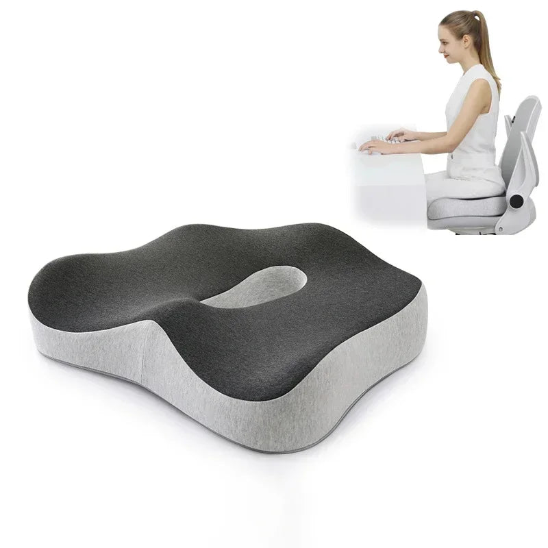 Comfortable office chair cushion with ergonomic design. Gray memory foam seat pillow provides lumbar and coccyx support for improved posture and reduced back pain.