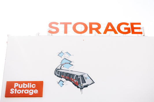 Public storage building with a sign.