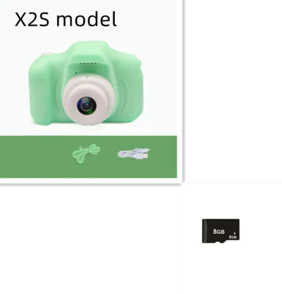 Compact green kids camera with lens and memory card