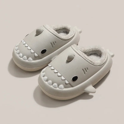 Cute kids' shark-themed plush slippers with a thick, waterproof bottom from the naiveniche brand