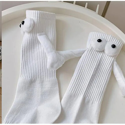 Cozy white mid-calf socks with playful eyes, ideal for parents and kids.