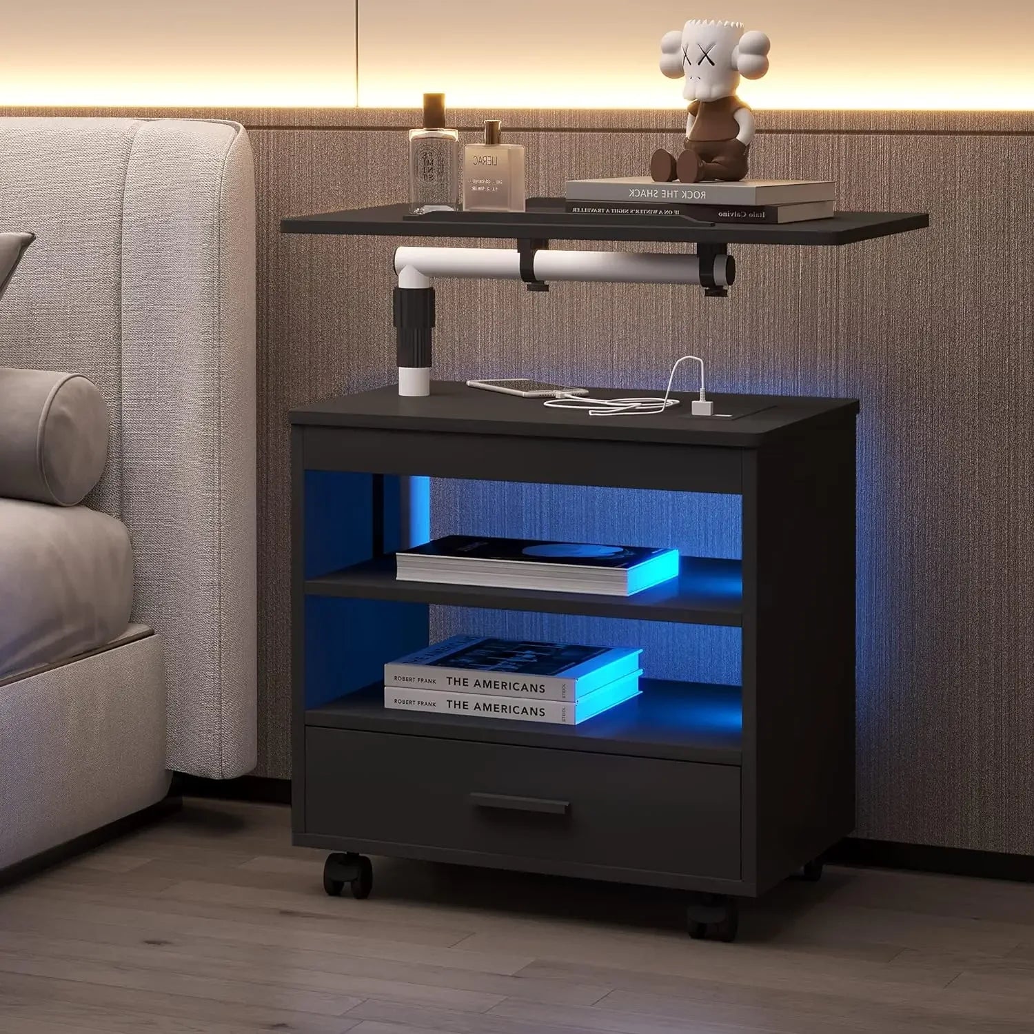 Elegant modern black nightstand with adjustable laptop tray and storage space for bedroom essentials