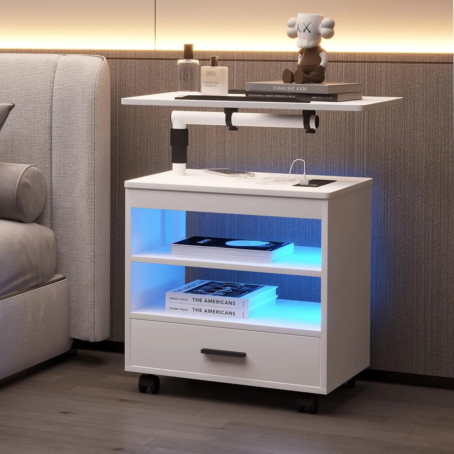 Modern Bedside Table with Storage and Laptop Tray
This image showcases a versatile night stand with multiple features, including storage space, a laptop tray, and LED lighting. The sleek and contemporary design makes it a practical and stylish addition to any bedroom or living room.
