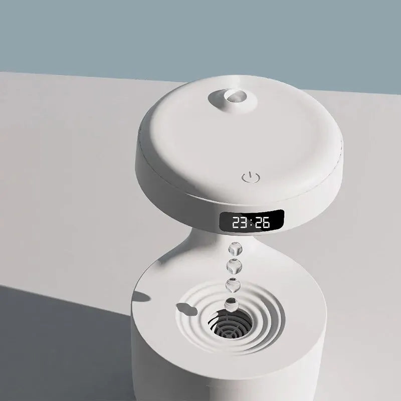 Stylish Compact Humidifier: Round white humidifier with digital display and touch controls, creating a cool, soothing mist with an ambient night light feature.