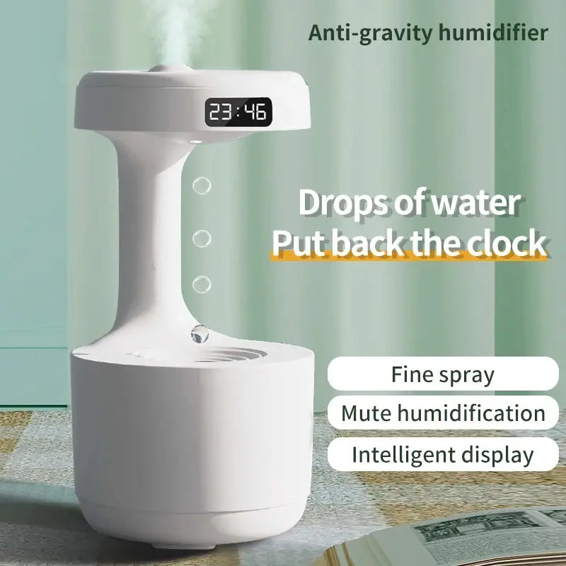 Sleek white anti-gravity ultrasonic humidifier with intelligent LED display, fine mist spray, and night light functionality for home or office.