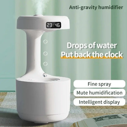 Sleek white anti-gravity ultrasonic humidifier with intelligent LED display, fine mist spray, and night light functionality for home or office.