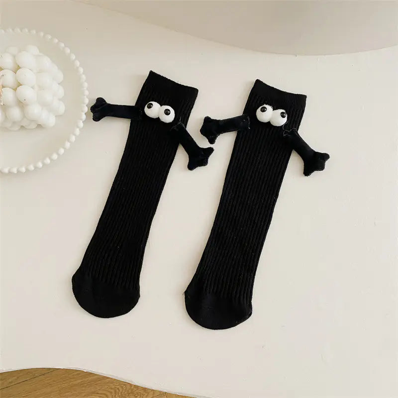 Cute Solid Black Kids' Mid-Calf Socks with Playful Googly Eyes