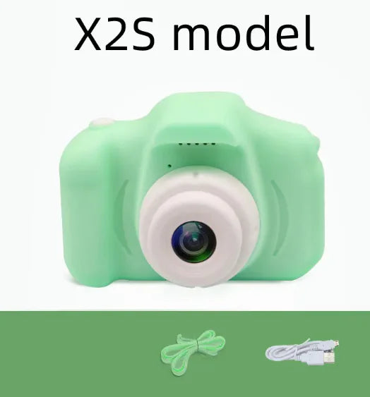 Compact green kids' camera with lens and accessories