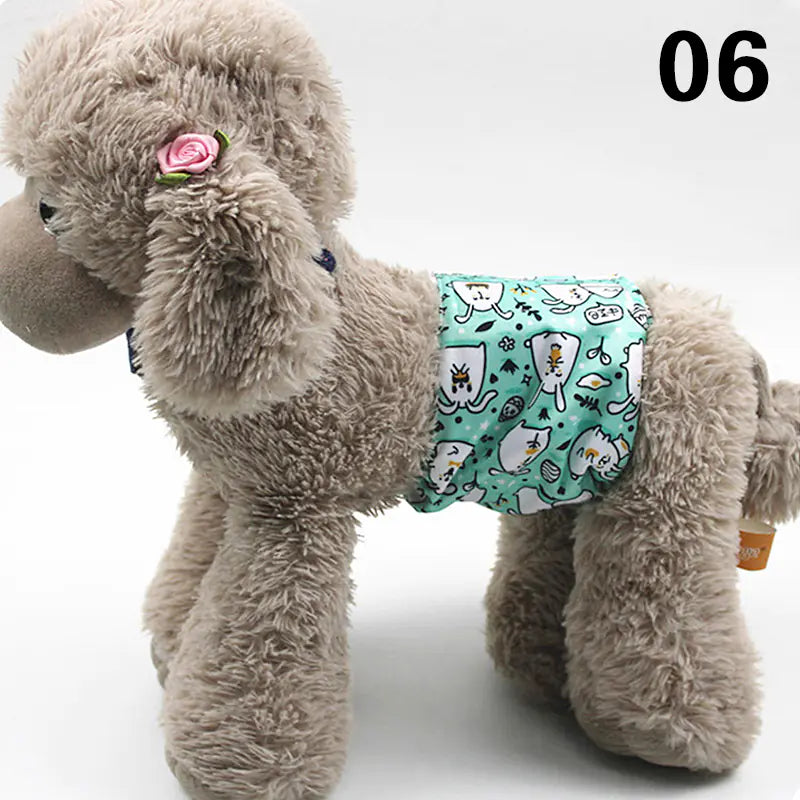 Plush gray dog toy wearing a patterned pet diaper or pad for incontinence protection, placed on a plain white background.