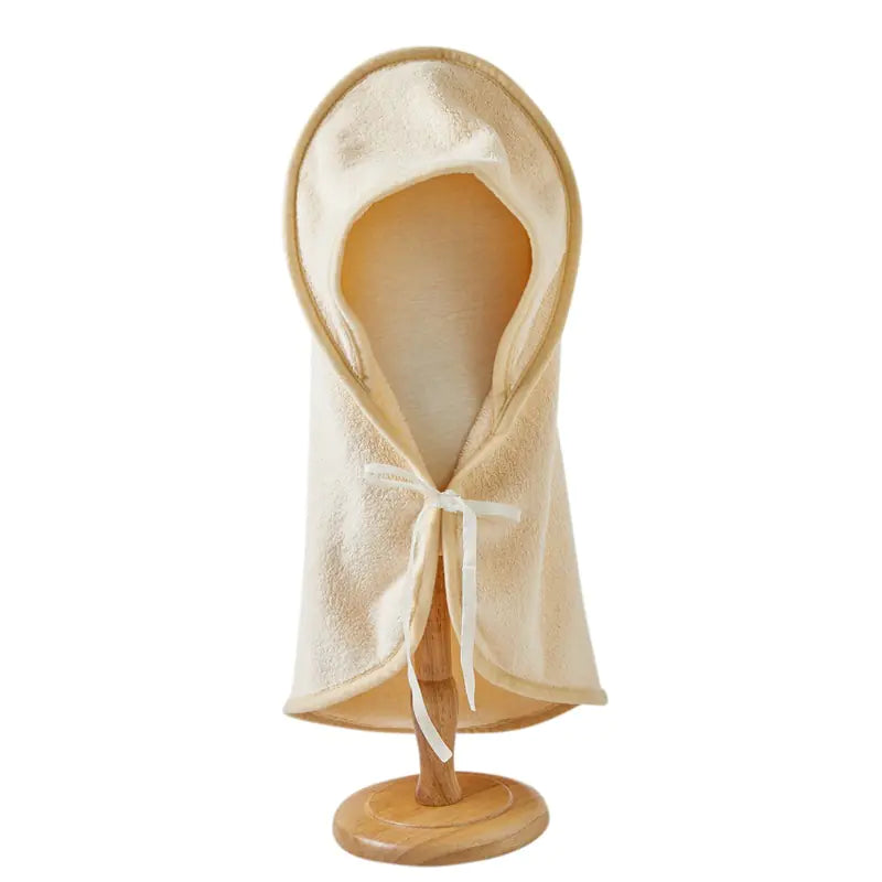 Cozy microfiber pet bathrobe on wooden stand