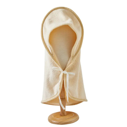 Cozy microfiber pet bathrobe on wooden stand
