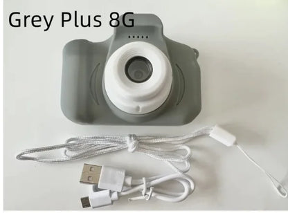 Gray compact camera with child-friendly design for easy use. Features a USB charging cable and lanyard strap for convenient portability. This kids' camera from the NaiveNiche brand offers a simple, user-friendly photography experience.